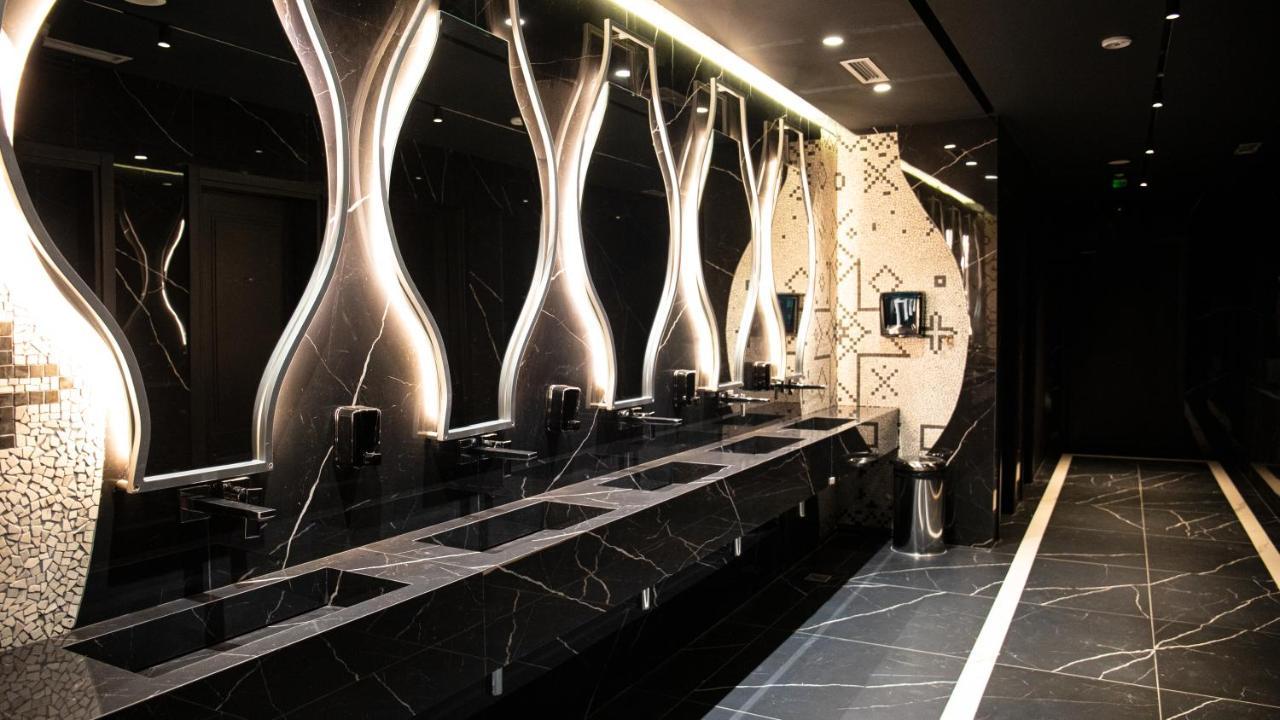 Arka Art Hotel Tirana Kültér fotó The interior of the restroom at the 2012 Olympics